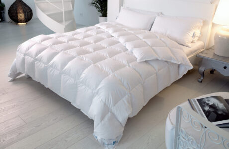 Vivere la felicità in casa grazie al caldo abbraccio di piumini, cuscini e topper